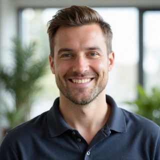 Professional portrait of a team member, Marcus Thorne, in a natural setting